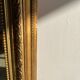 Gilded mirror with frieze h2m10 l:73cm
