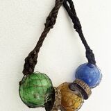 Fishing floats made of blown glass, cork, and rope. France, 1960s.