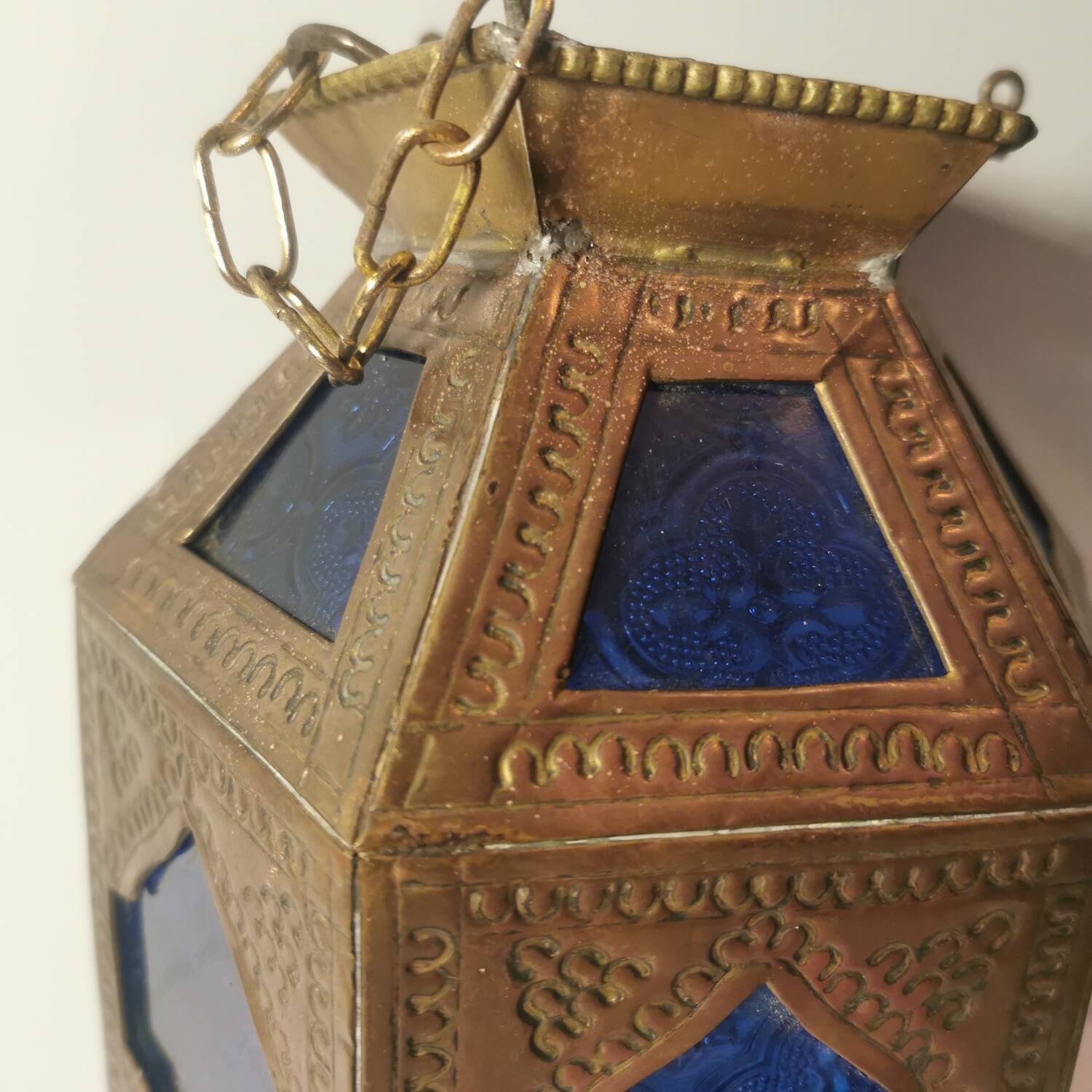 Oriental style hanging lantern in brass and dark blue glass