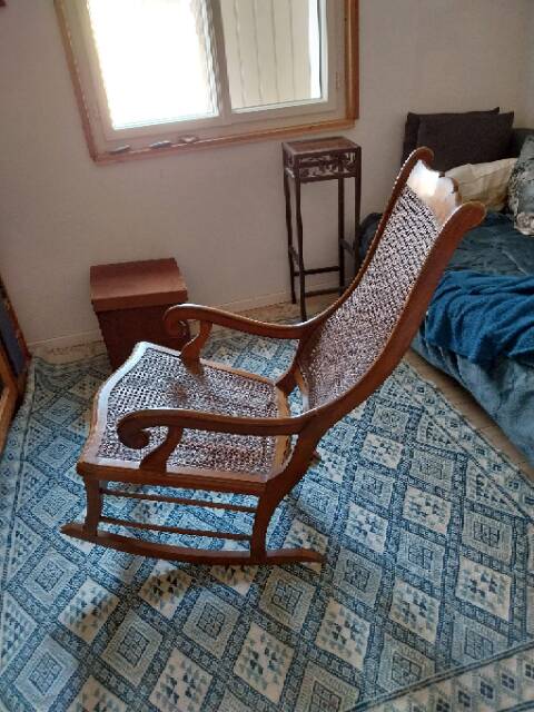 rocking chair wood and caning in ancient Egyptian style