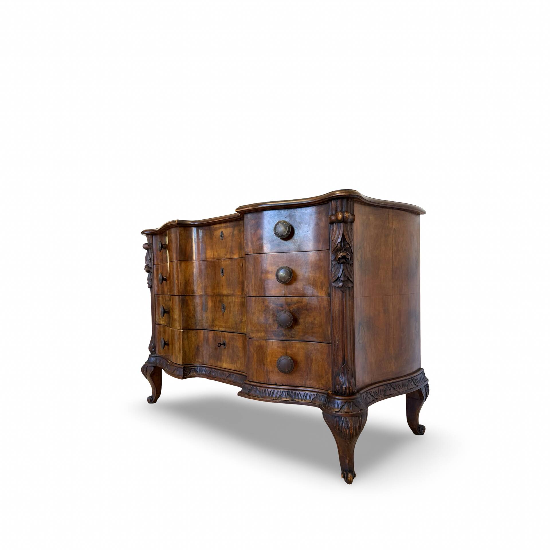 serpentine commode in antique walnut