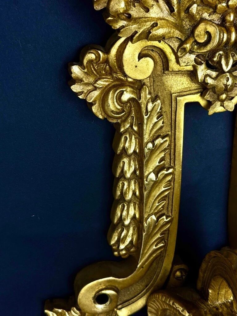 A pair of important gilt bronze wall sconces, Louis XVI style, 19th century.