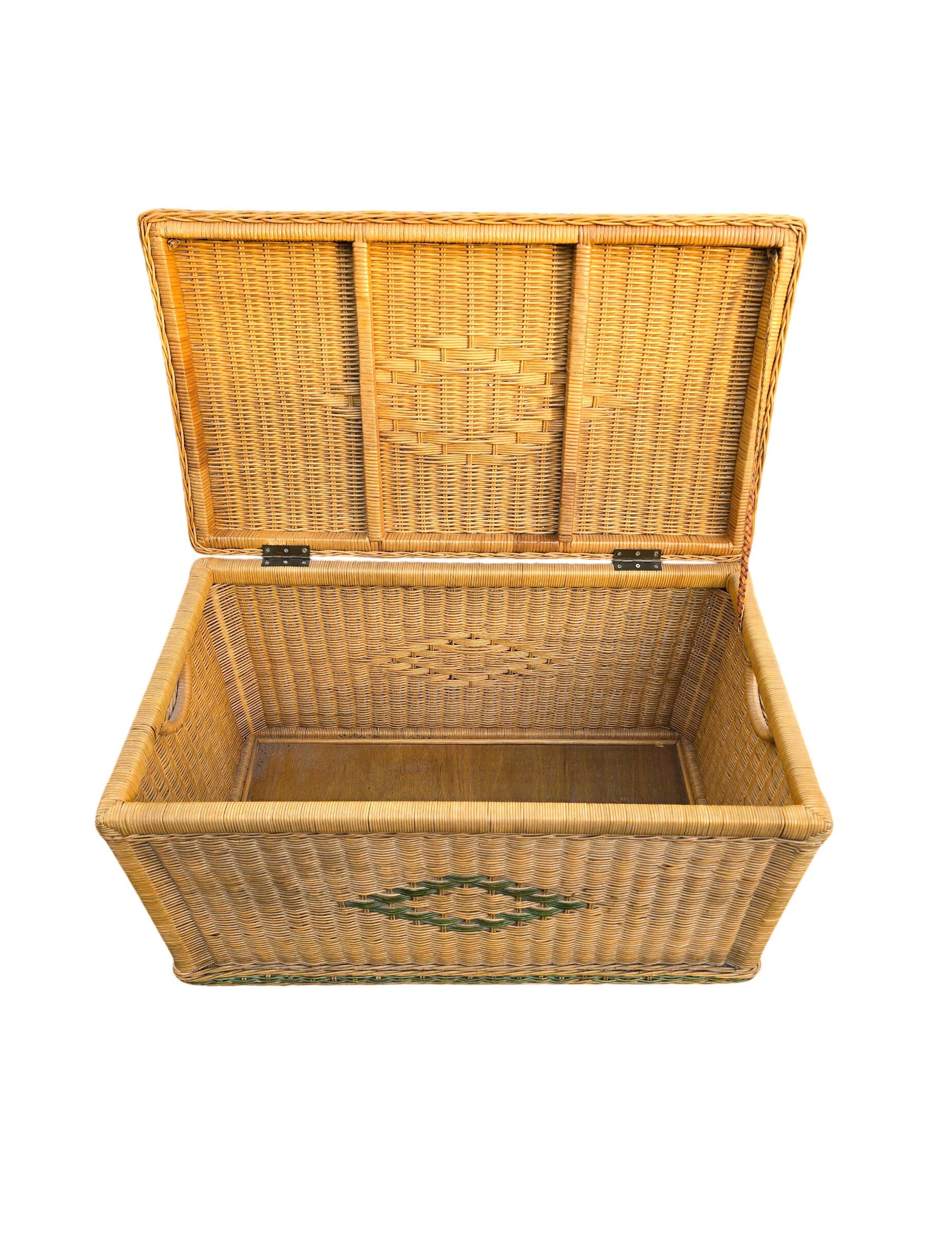 Large vintage wicker chest with green decoration.