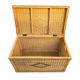 Large vintage wicker chest with green decoration.