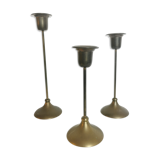 Trio of brass candlesticks