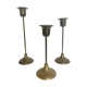 Trio of brass candlesticks