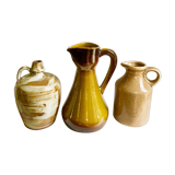 Set of three glazed ceramic pitchers