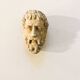 Plaster head to hang