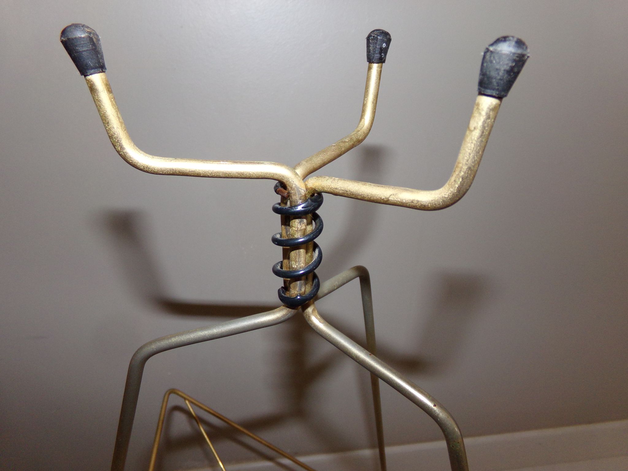 Vintage magazine holder in gold metal