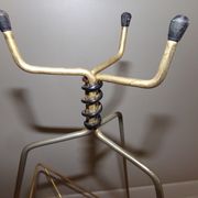 Vintage magazine holder in gold metal