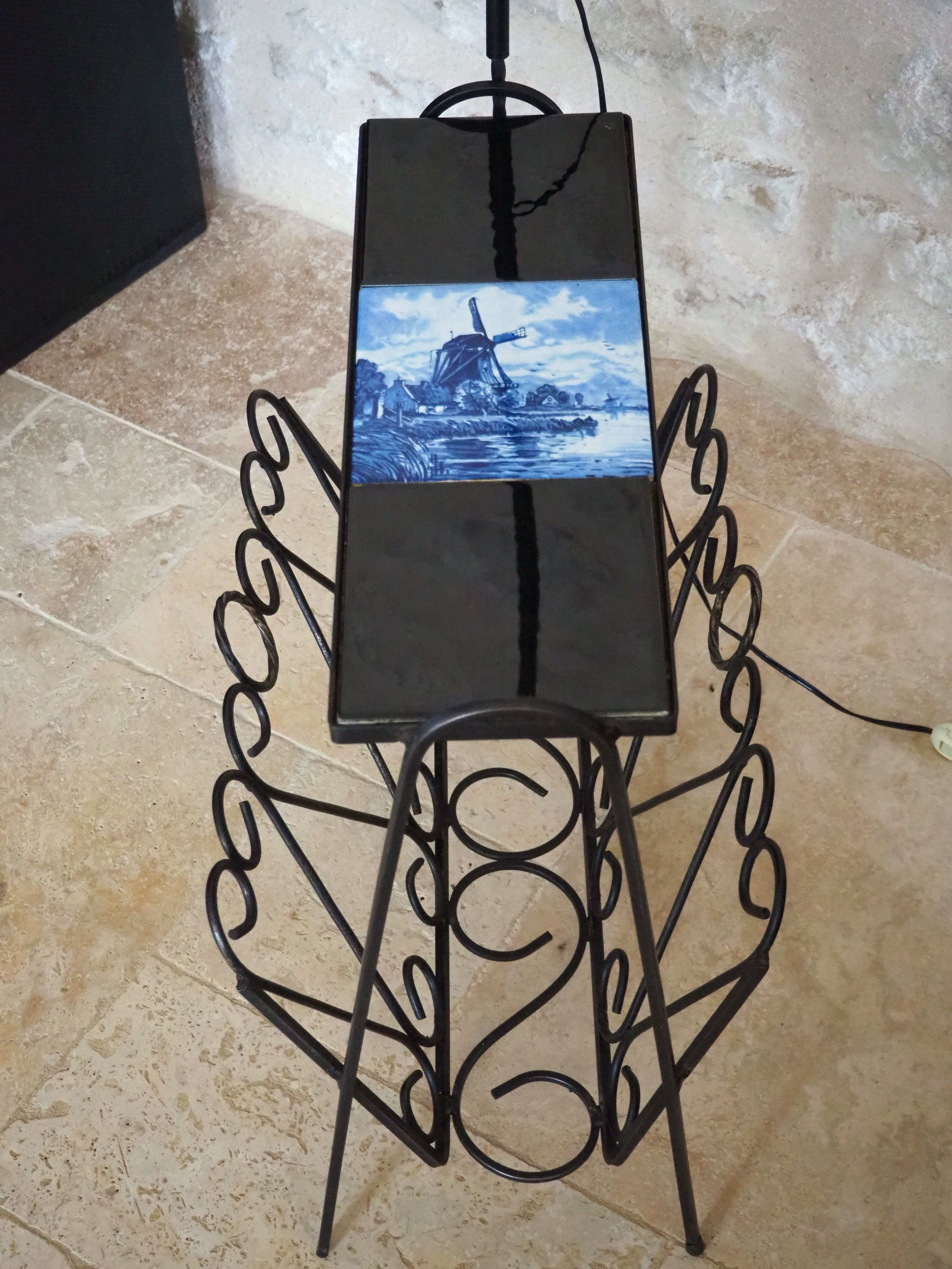 1970s black wrought iron ironing board with enamelled tiles