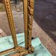 Large closed mirror, 19th century, wood and gilded stucco.