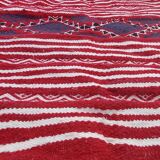 Handmade multi-coloured red carpet