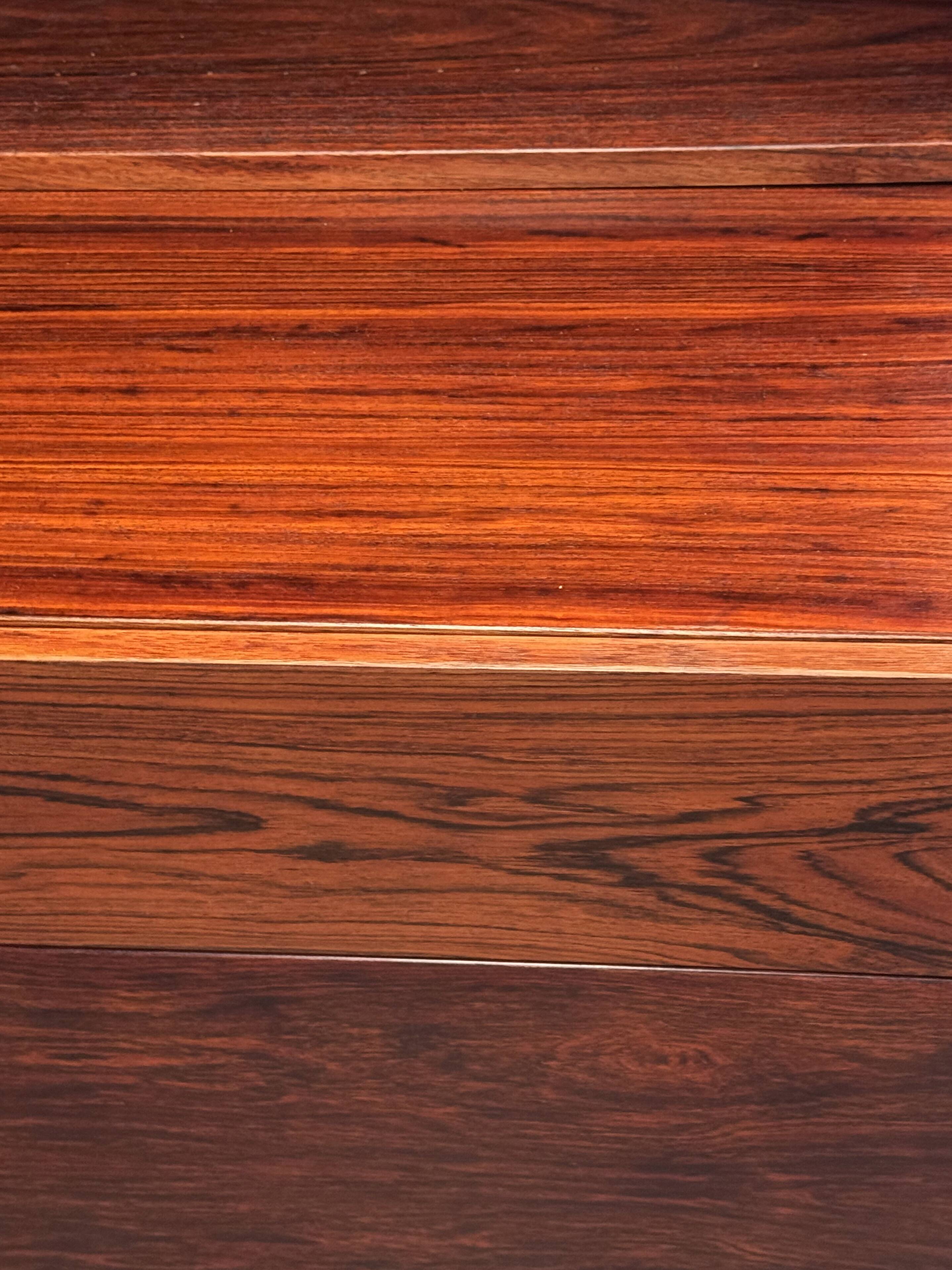 Scandinavian library in rosewood designed by Ib Kofod Larsen.