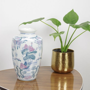 Vintage porcelain vase with pink flowers