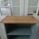 Small vintage bookcase enhanced in smoky green