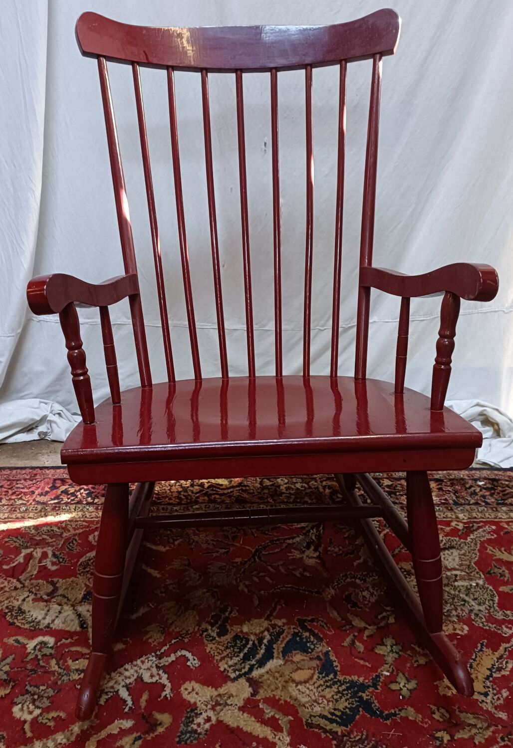 Vintage wooden rocking chair burgundy paint