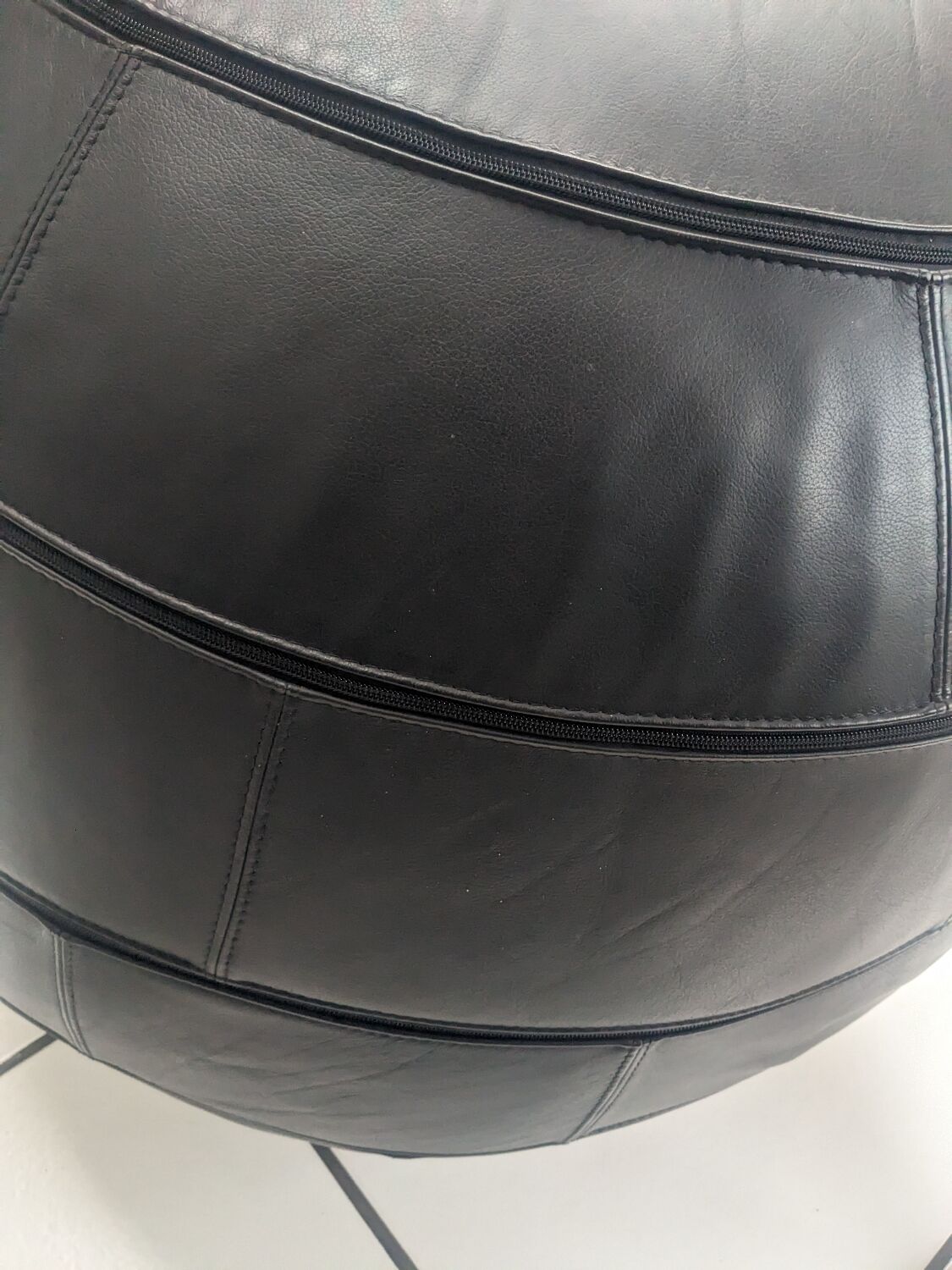 Black leather ottoman by Edwin and Niekel Taco for Leolux 90
