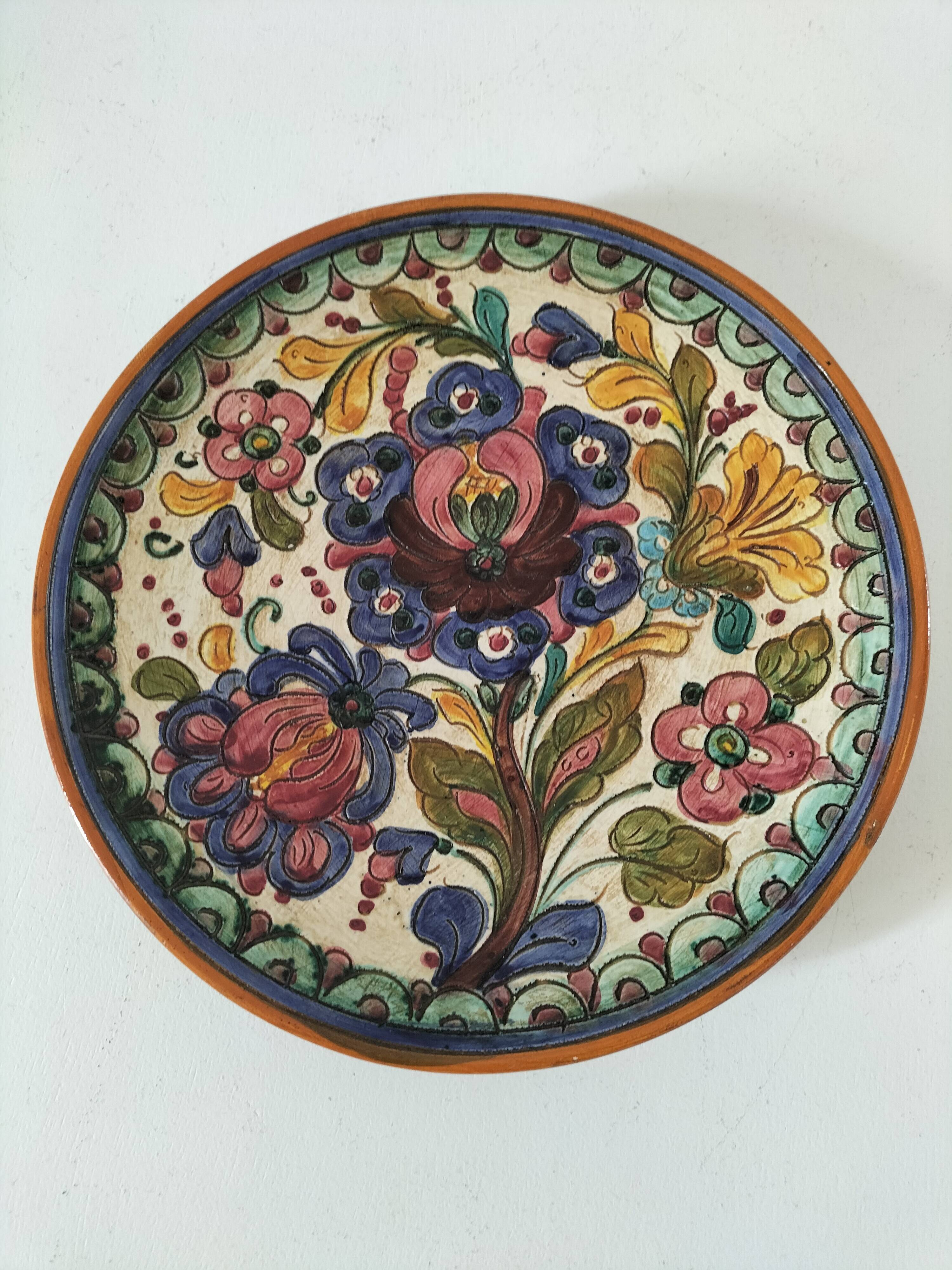 Spanish earthenware plate, hand-painted floral decoration.