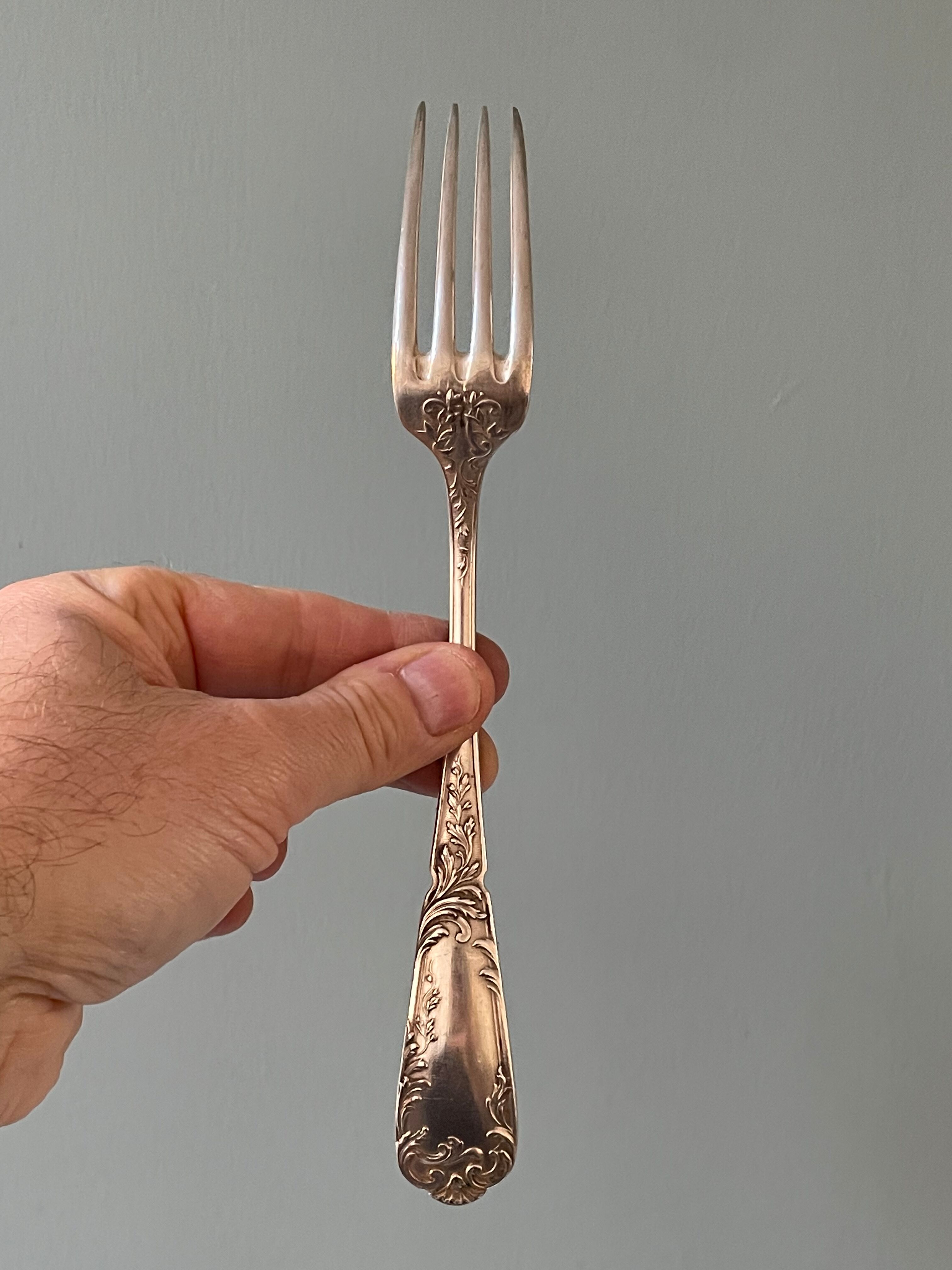 Series of 21 antique silver metal table forks