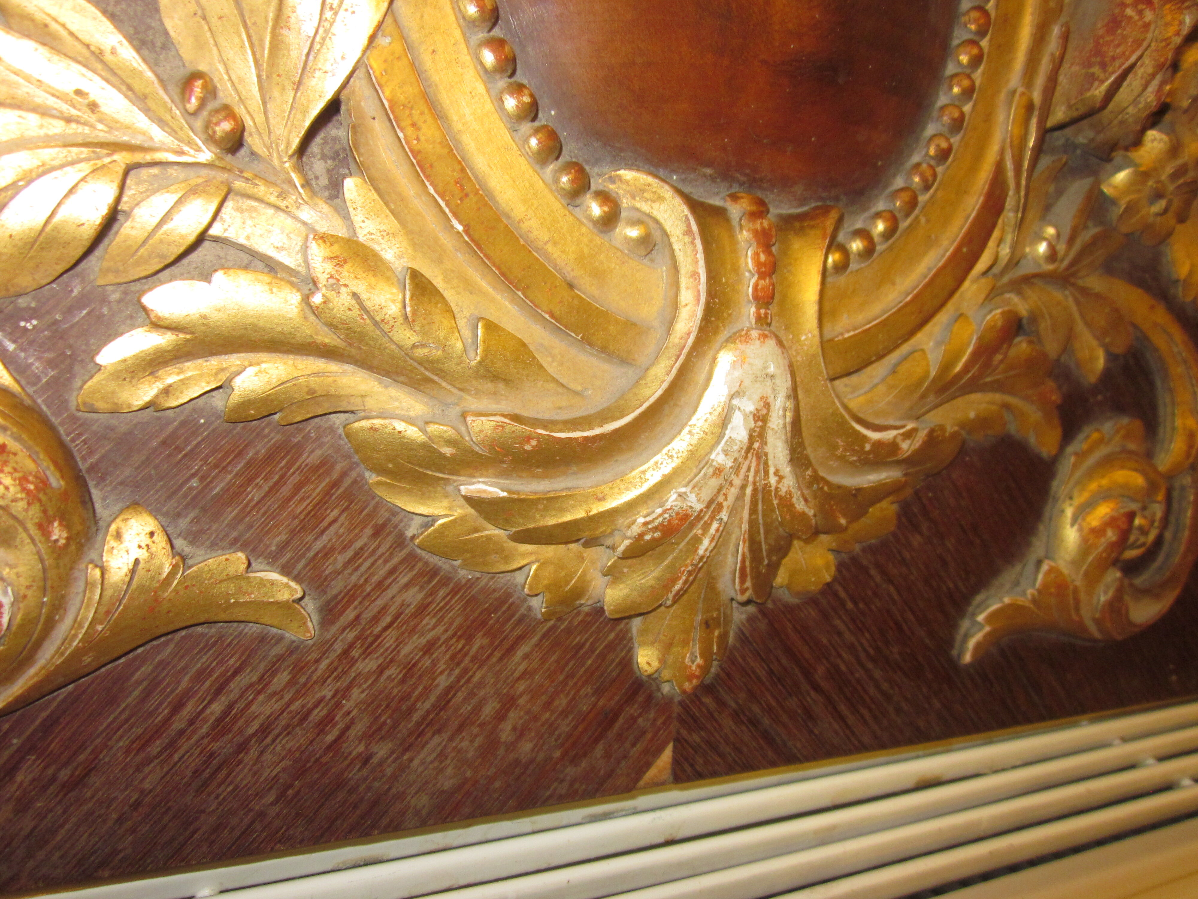 Old wooden pediment stucco