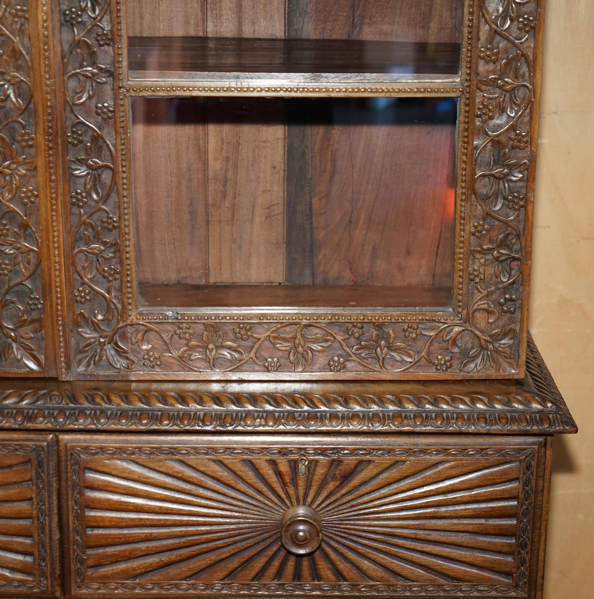 19th-century Anglo-Indian colonial hardwood library on a chest of drawers.