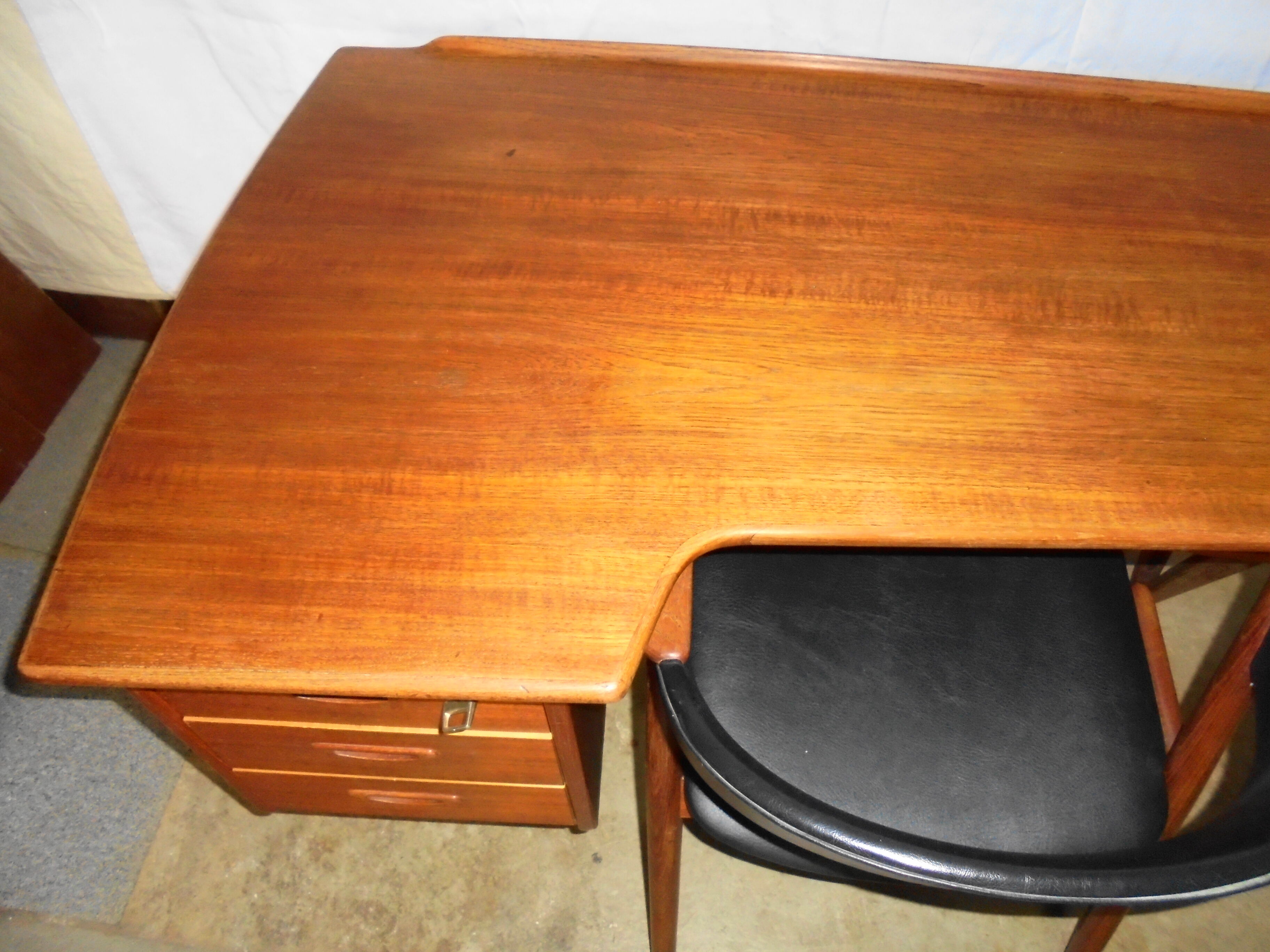 Peter Lovig Nielsen's Scandinavian teak boomerang desk from the 60s