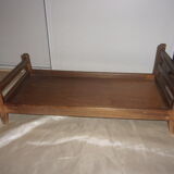 Old wooden doll bed