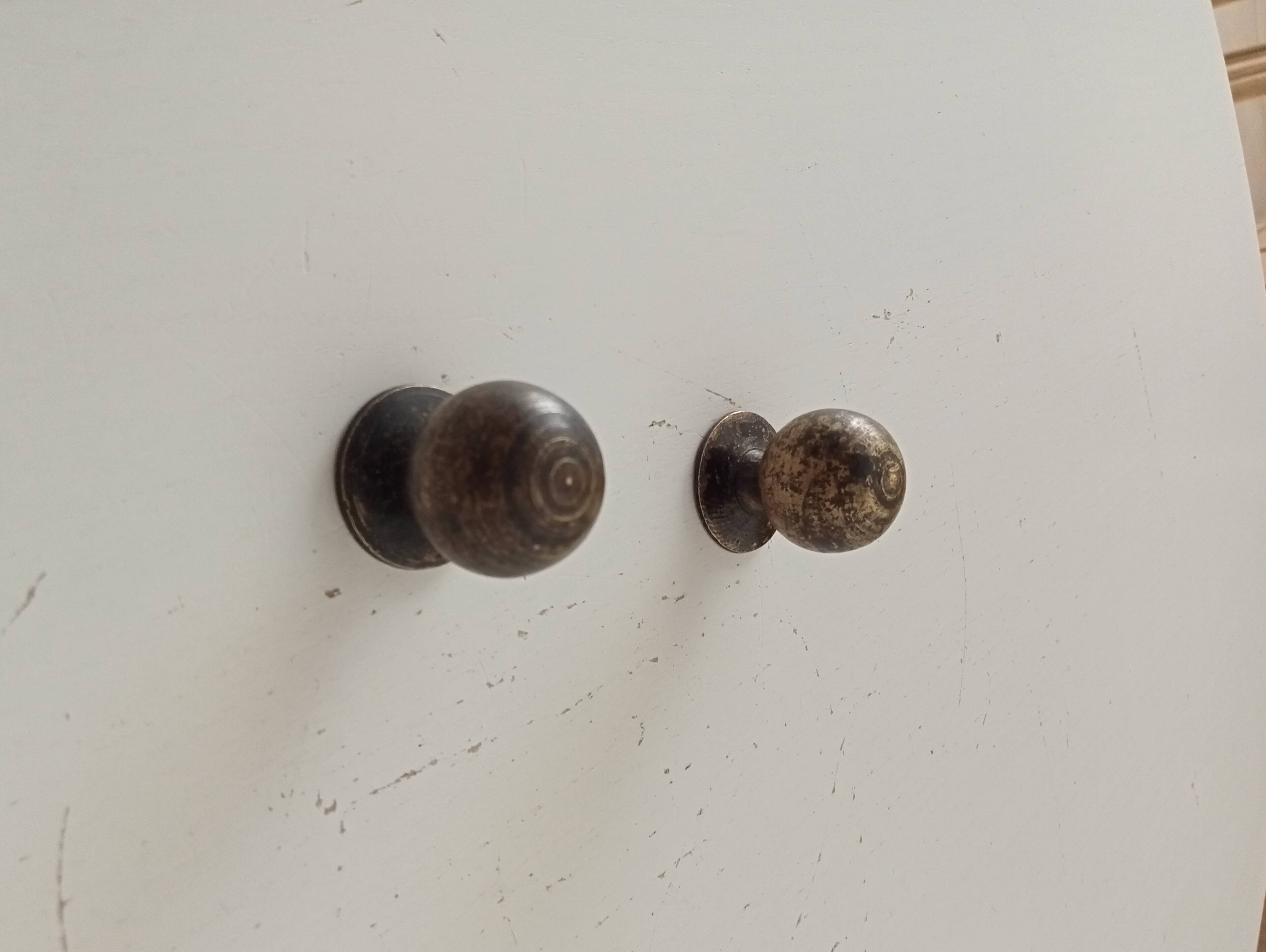 Pair of antique bronze furniture handles.