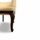 An antique Italian bar chair and a matching tufted vanity stool.