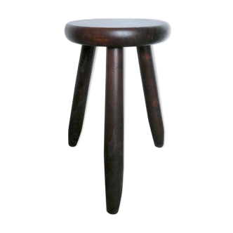 Dark wooden tripod stool