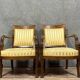 Pair of Empire period mahogany dolphin armchairs