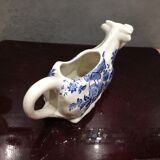 English porcelain cow-shaped sauce dish