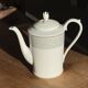 Bavarian porcelain teapot from Germany with blue frieze and flower lid H23