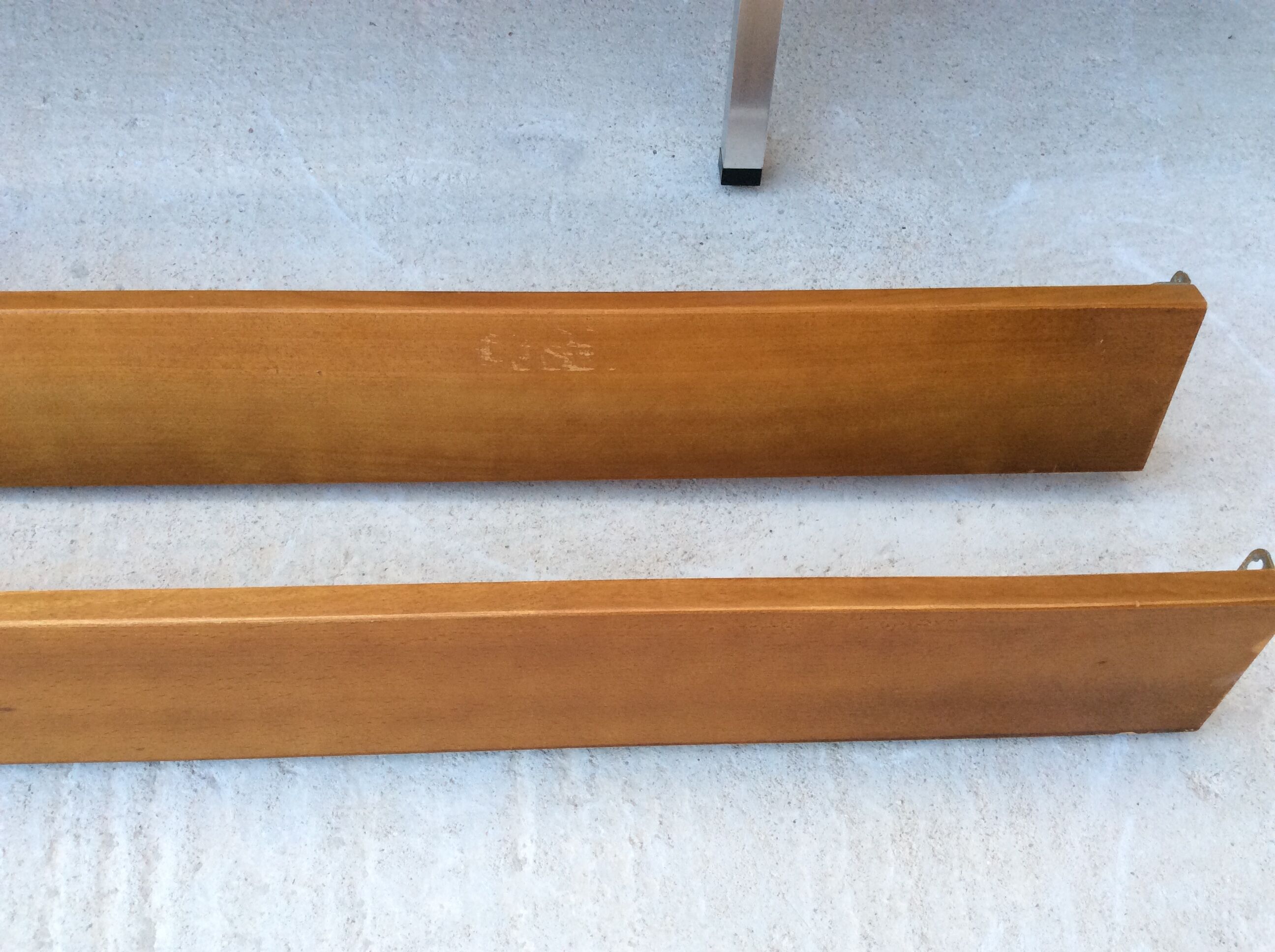 Scandinavian-style teak bed with integrated nightstands