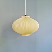 Vintage oval-shaped suspension in pleated celluloid, light green colour, 1960.