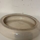 Empty pocket, cracked ceramic dish 1980