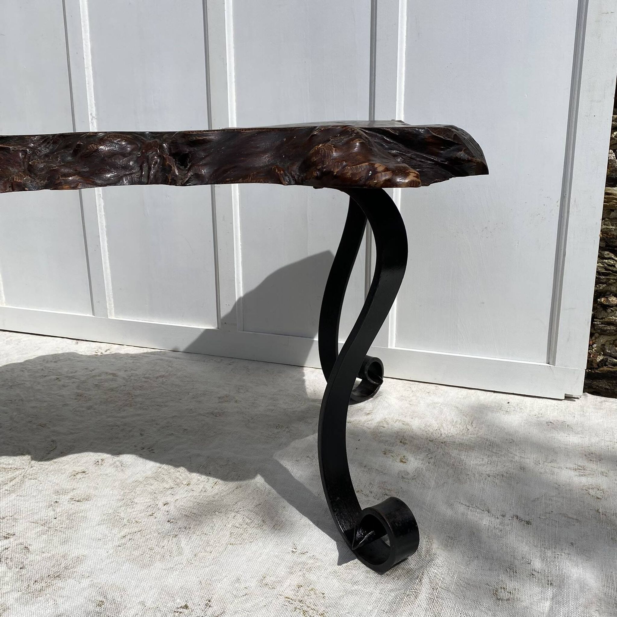 Brutalist coffee table in solid elm and wrought iron, ram's horn legs.