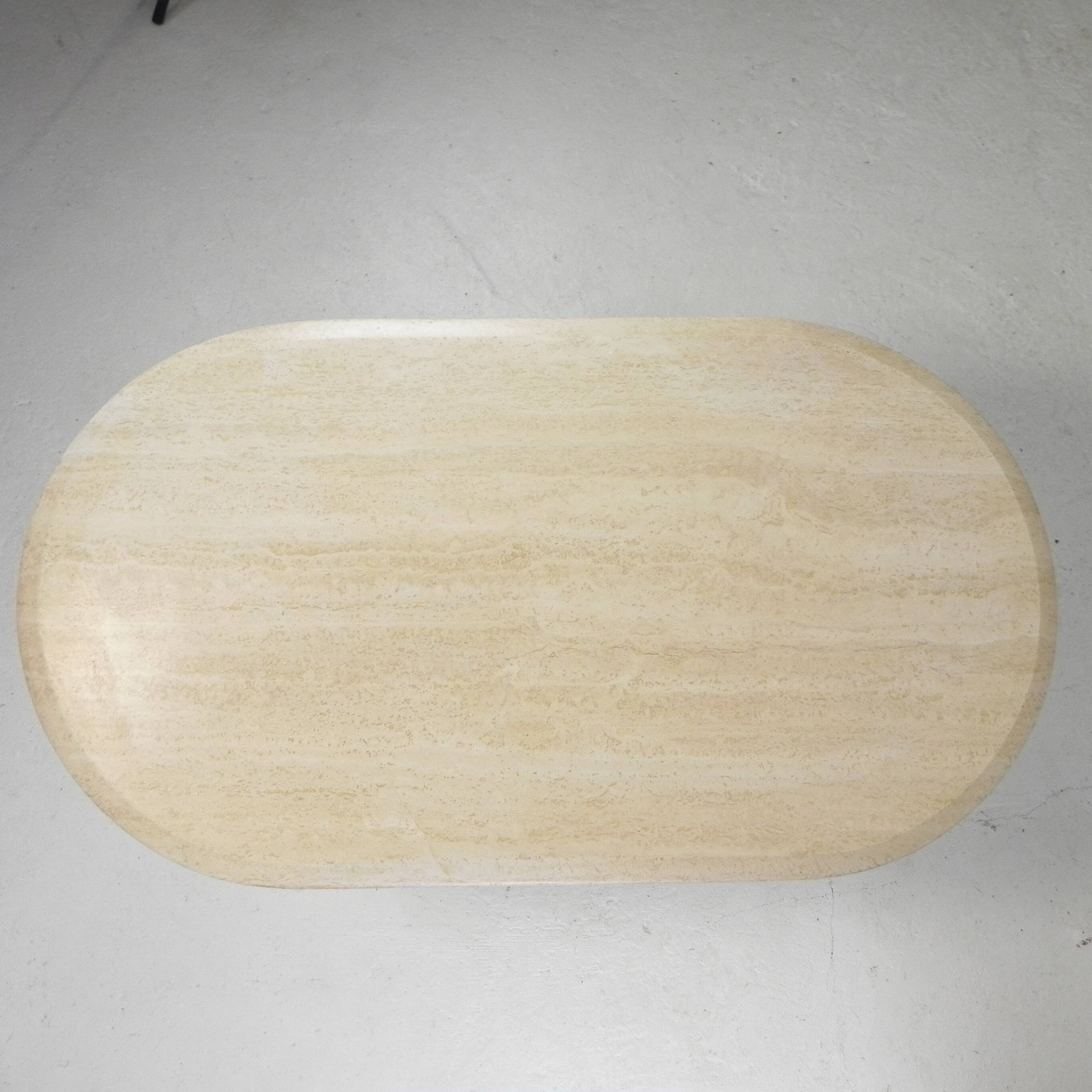 Mid-Century travertine coffee table with an oval top, 1970s.