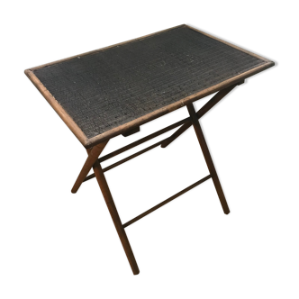 Old folding table in rattan and wood