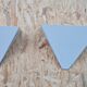 Pair of triangular lacquered metal sconces