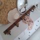 Wooden and metal wall hook