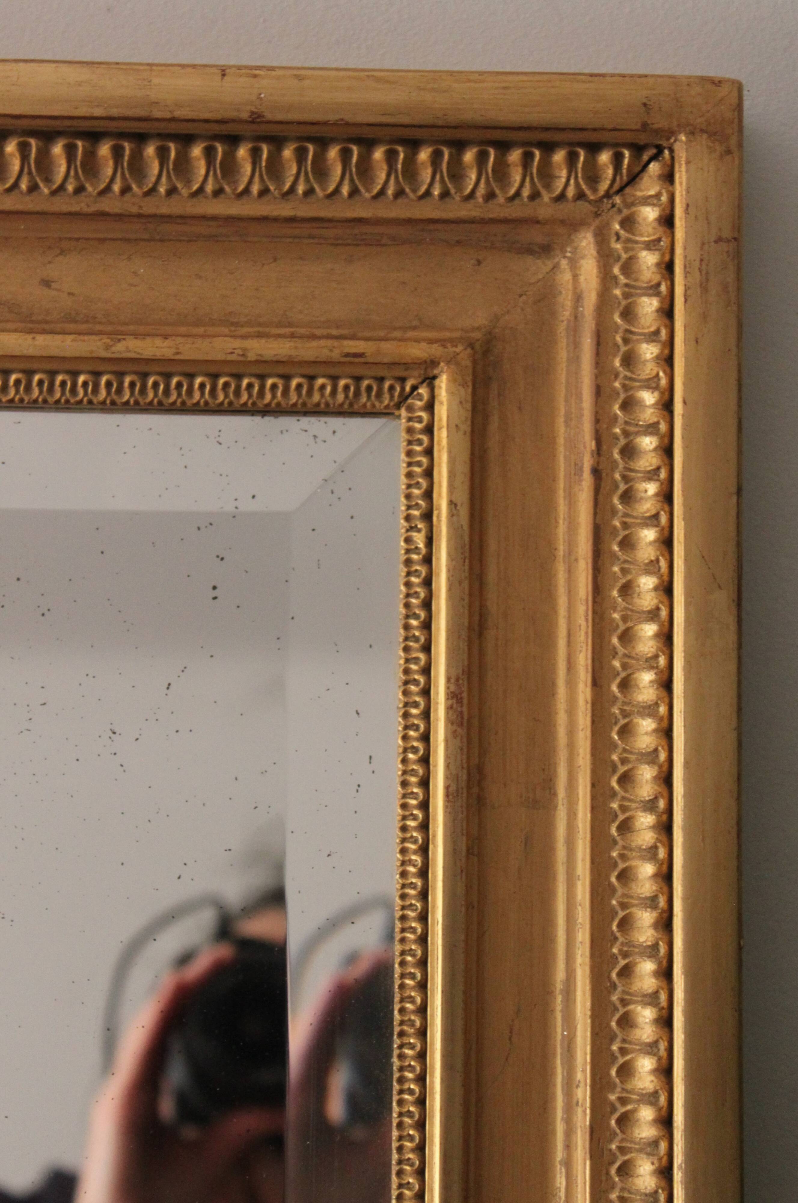 Large bevelled gold mirror