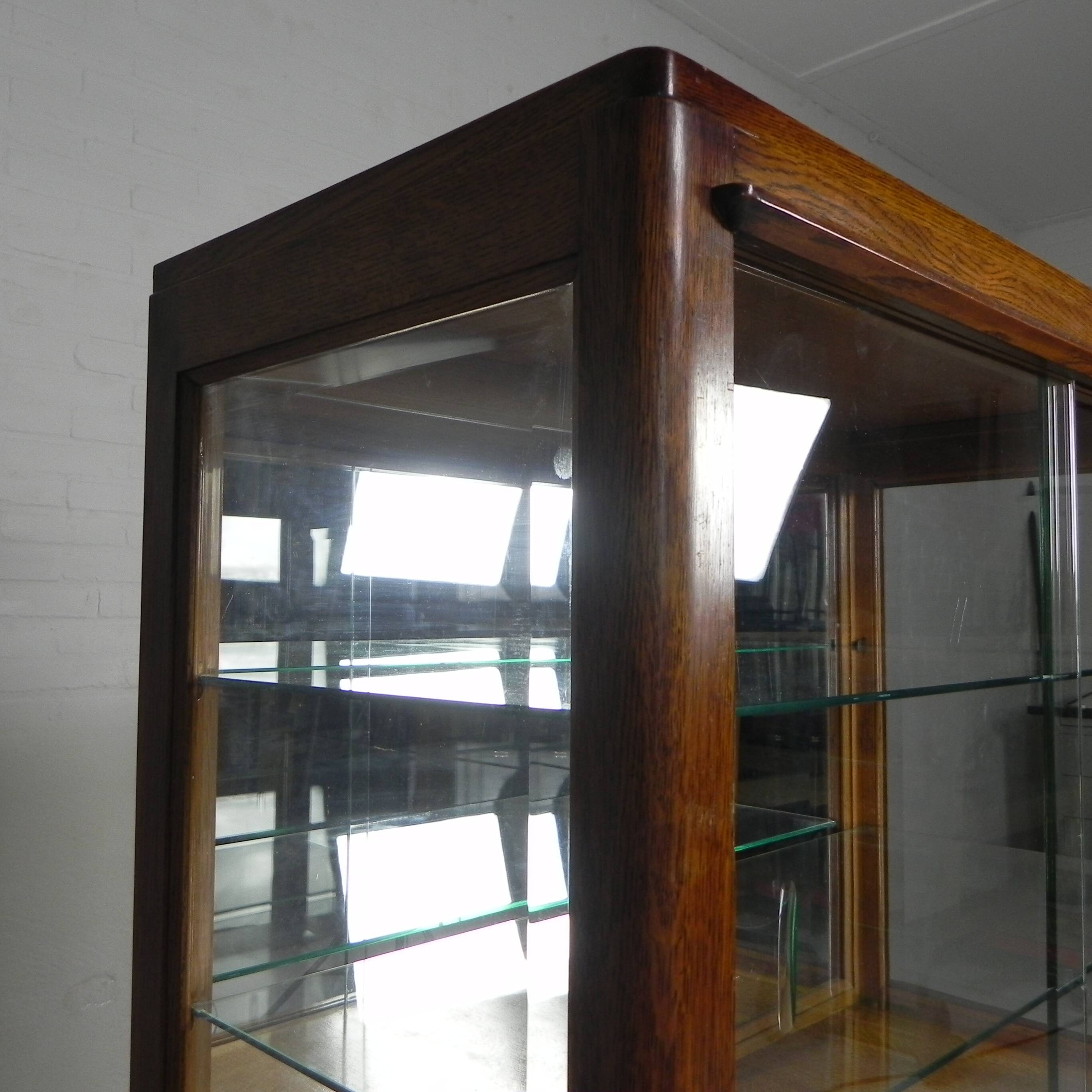 Art Deco display cabinet with sliding glass doors