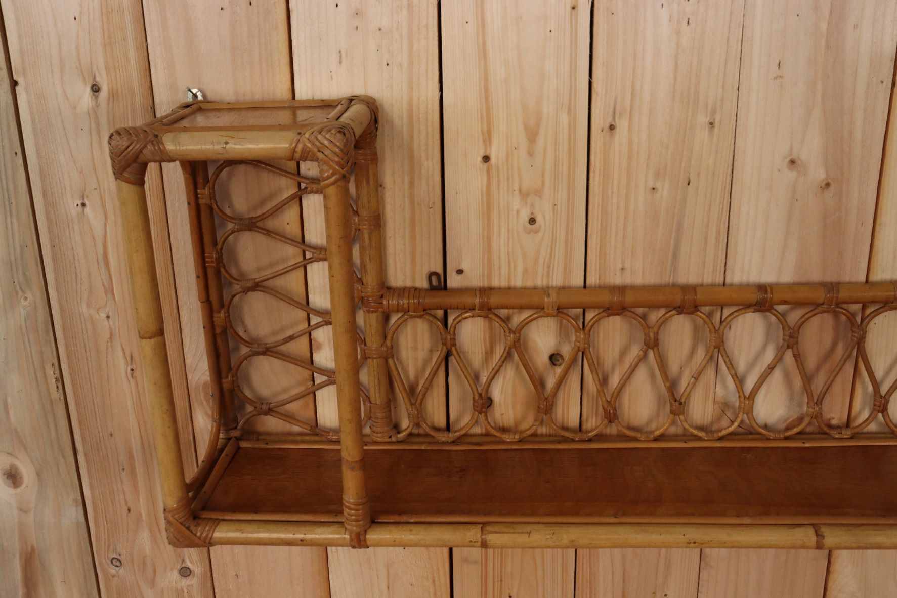 Rattan wall shelf