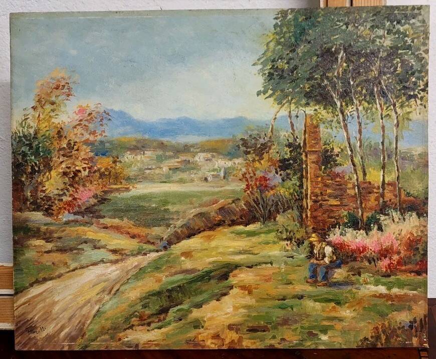 Oil painting on panel of a rural landscape, signed.