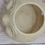 Cache pot visage