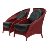 Ensemble de 2 fauteuils sculpturaux en rotin laqué rouge, années 1970