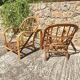Paire de chauffeuses en rotin Audoux Minnet 1960