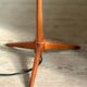 Scandinavian tripod reading lamp in teak and brass.